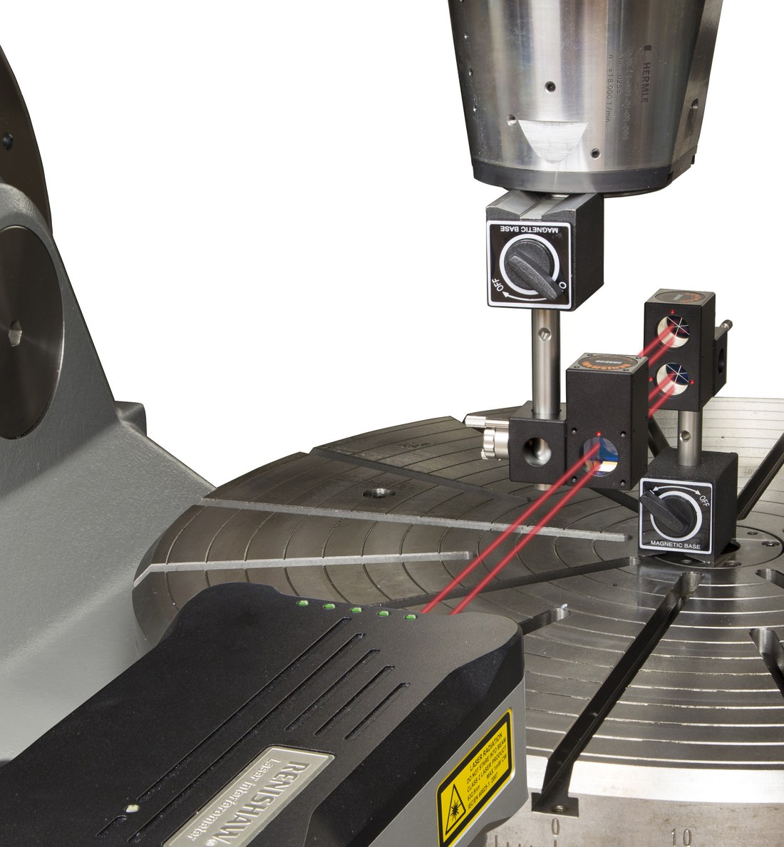 Sistema láser Renishaw XL-80 con sus ópticas montado sobre una máquina
